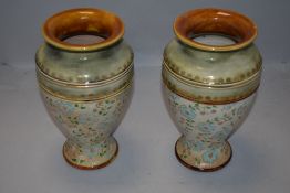 A pair of Doulton Lambeth vases incised with Slater to underside also