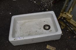 A shallow Belfast style enamelled sink