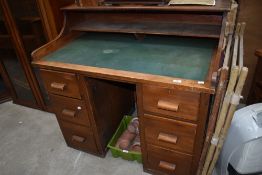 An early to mid 20th Century stained frame office desk