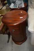 A pair of modern mahogany pot cupboards, of cylindrical form