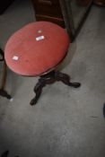 A Victorian mahogany piano stool