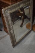 A reproduction classical style mirror