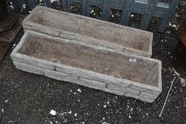 Two concrete planters
