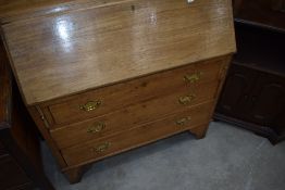 A bleached mahogany bureau, key included