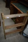 A vintage wooden clothes maid, triple section