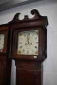 A 19th Century long case clock , having 8 day movement and painted dial, signed for Wm Scales ,