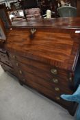 A 19th Century mahogany bureau having fitted interior , width approx 117cm, key included