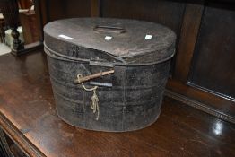 A vintage tin hat box