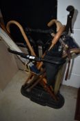 An Antique cast stick stand, in the Coalbrookdale style