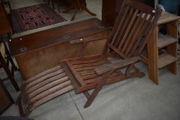 A teak garden lounger