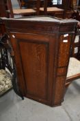A 19th Century oak corner cupboard