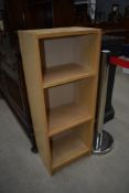 A modern beech laminate bookshelf
