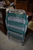 A pair of folding Lallermand garden chairs