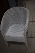 A Lloyd Loom tub chair
