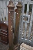 A pair of cast gate stoups