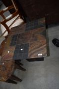 A vintage slate coffee table, approx. 60 x 60cm