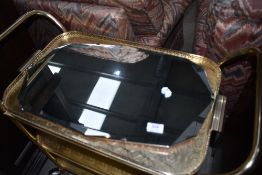 A vintage frameless wall mirror, width approx. 56cm