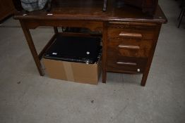 A vintage oak desk of small proportions, labelled Abess