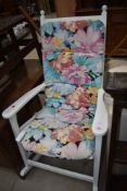 A traditional painted rocking chair