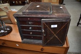 A 19th Century fitted cabinet of small proportions