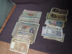 A collection of vintage used World Banknotes
