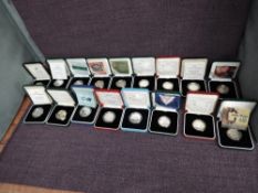 A collection of Seventeen Elizabeth II United Kingdom Two ound Silver Proof Coins in original