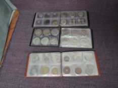 Three small coin albums containing GB & World Coins including 1723 Irish Half Penny, 1799 Half