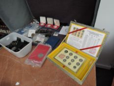 A large collection of GB and World Coins including Churchill Crowns, six Brilliant Uncirculated 1995