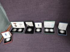 A collection of 8 Queen Elizabeth II Royal Mint Fifty Pence Silver Proof Coins, 1992-1993 Presidency