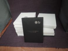 A collection of 12 Queen Elizabeth II Royal Mint Proof Year Sets 2000-2012 excluding 2009, all in