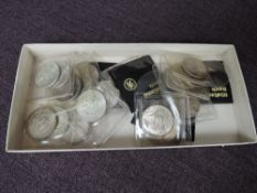 A collection of USA Dollars & Half Dollars, 21 Silver 1964 Half Dollars and one 1965 Half Dollar,