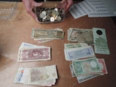 A collection of World Banknotes and Coins, mixed vintage, all used
