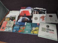 A collection of 28 Queen Elizabeth II Royal Mint Uncirculated Coins in presentation folders, 5 Fifty