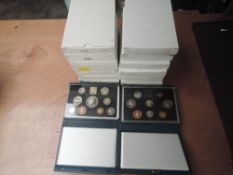 A collection of 19 Queen Elizabeth II Royal Mint Proof Year Sets, 1981-1999, all in original
