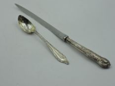 A silver handled paper knife having moulded handle in Kings pattern, Sheffield 1957, Viners, and