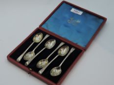 A cased set of Edwardian silver coffee spoons having moulded decoration to terminals, Sheffield