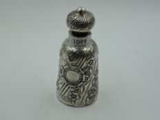A Victorian silver overlaid glass bottle of cannister form having embossed floral stripe