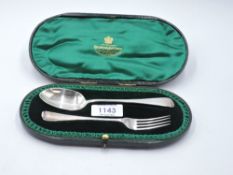 A cased child's Victorian/Edwardian silver spoon and fork of plain form, London 1900/01, Holland,