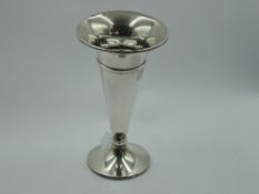 A silver vase of plain trumpet form having a weighted circular base, Birmingham 1922, makers mark