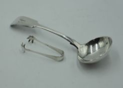 A Victorian silver sauce ladle of fiddle back form bearing monogram to terminal, London 1843,