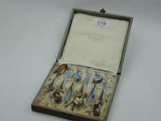 A cased set of six Norwegian silver coffee spoons having pale blue enamel decoration to front and