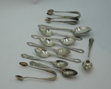 A selection of HM silver including sugar nips and tea/coffee spoons, approx 168g