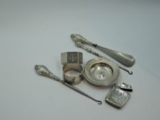 A selection of HM silver including small alms dish having oversized hallmarks, napkin rings, vesta