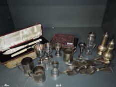 A selection of silver plate including tankards, goblets, cased flatware, cutlery etc