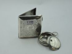 An Edwardian silver cigarette case having engraved decoration and monogrammed cartouche,