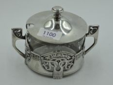 A WMF silver plated sugar bowl having clear glass liner and Art Nouveau style cover having pierced