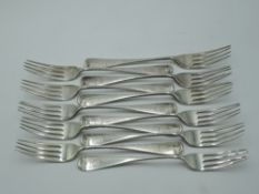Eleven Victorian silver dessert forks of plain form bearing monogram to terminals, Exeter 1873,