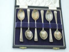A cased set of silver coffee spoons having moulded fan terminals, Birmingham 1958, Arthur Price &