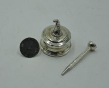 Three pieces of HM silver of golf interest including tee and marker and a paperweight bearing