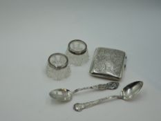 A small selection of HM silver including cigarette case, pair of cut glass salts with silver collars